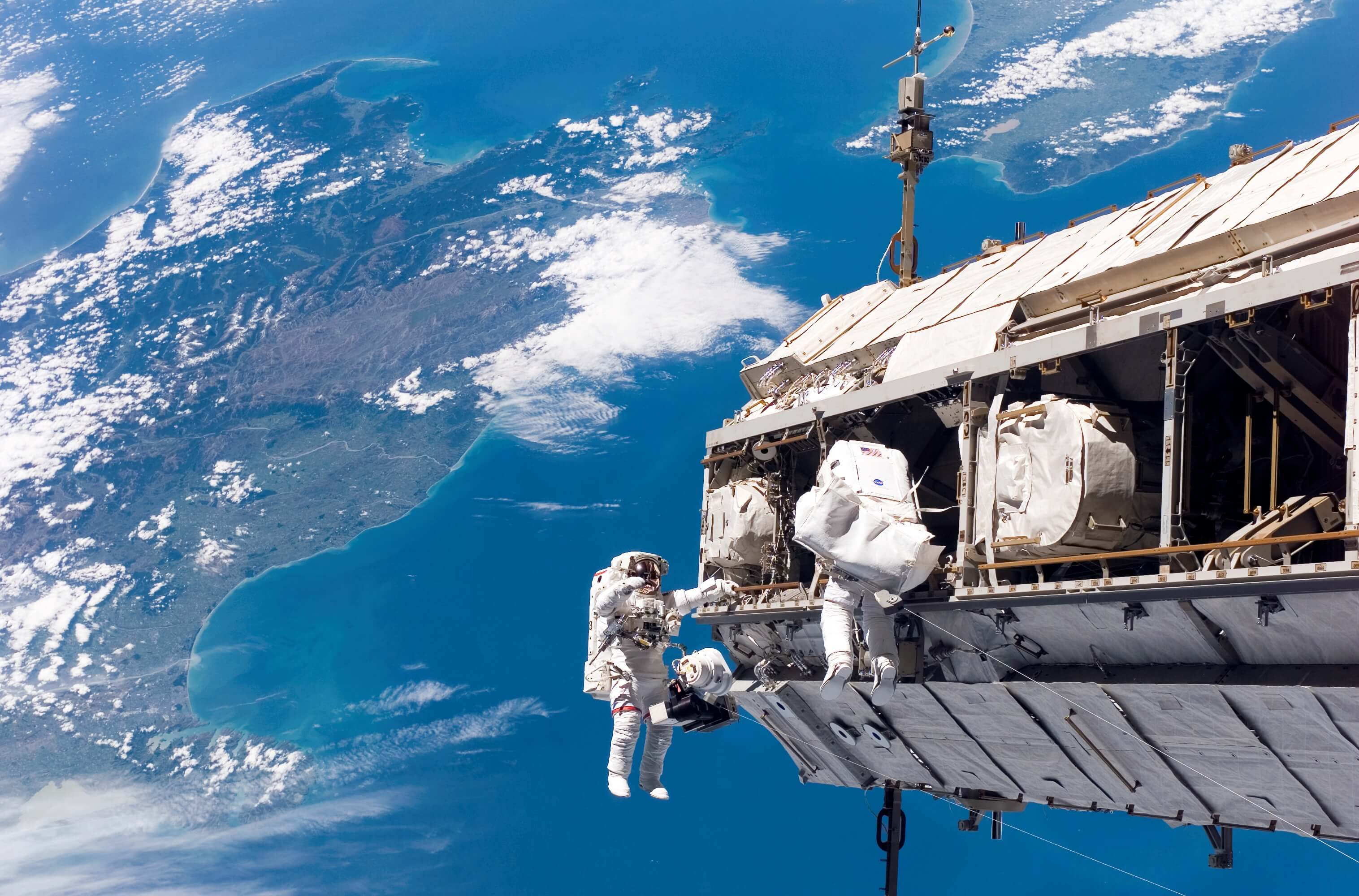 NASA astronauts on the exterior of the International Space Station