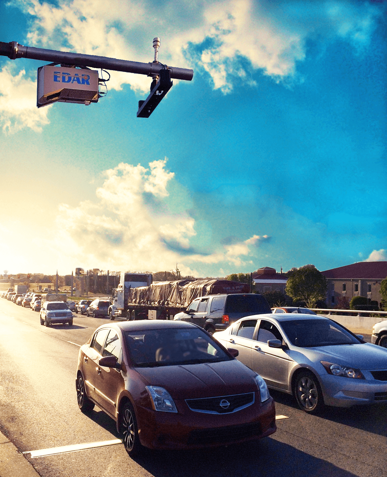 Remote carbon dioxide detector scanning cars as they pass on the highway
