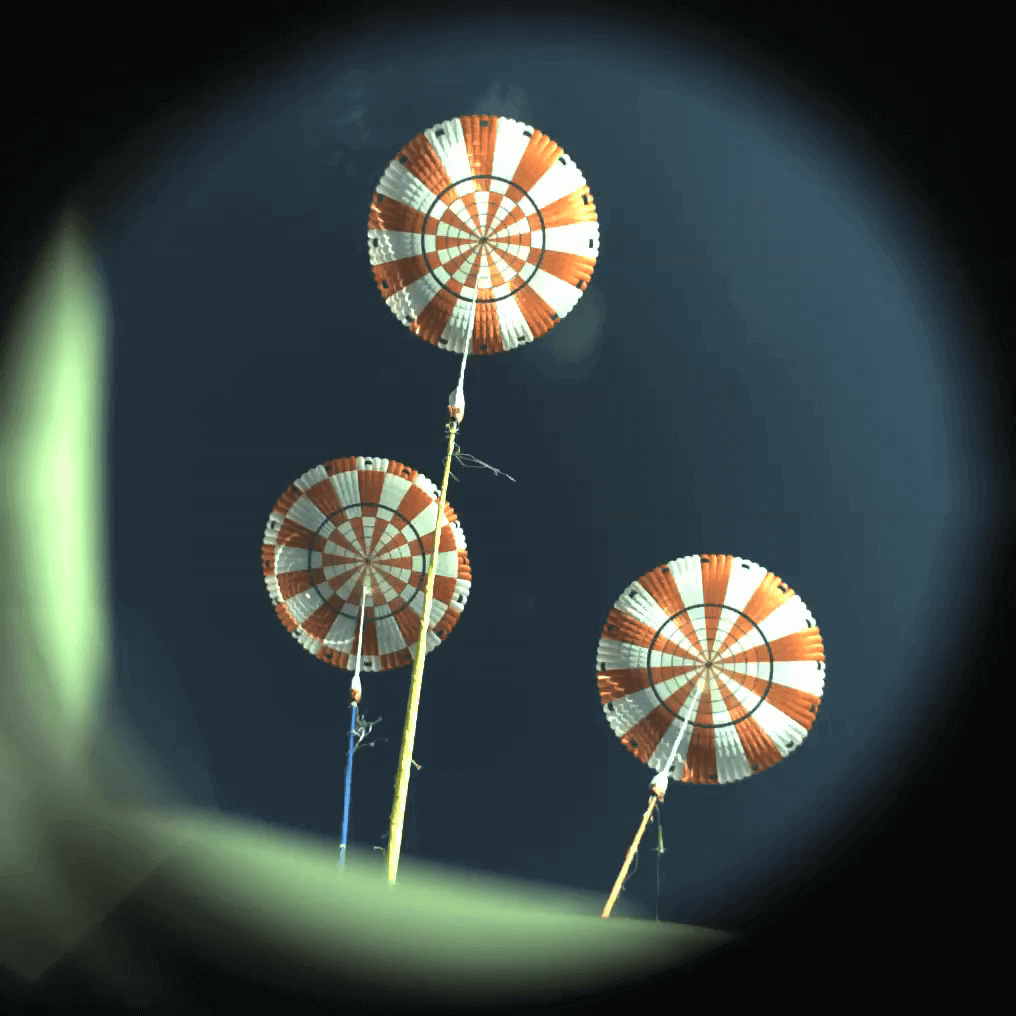 View of the Orion capsule's parachute deployment taken by high speed, high definition cameras inside the spacecraft
