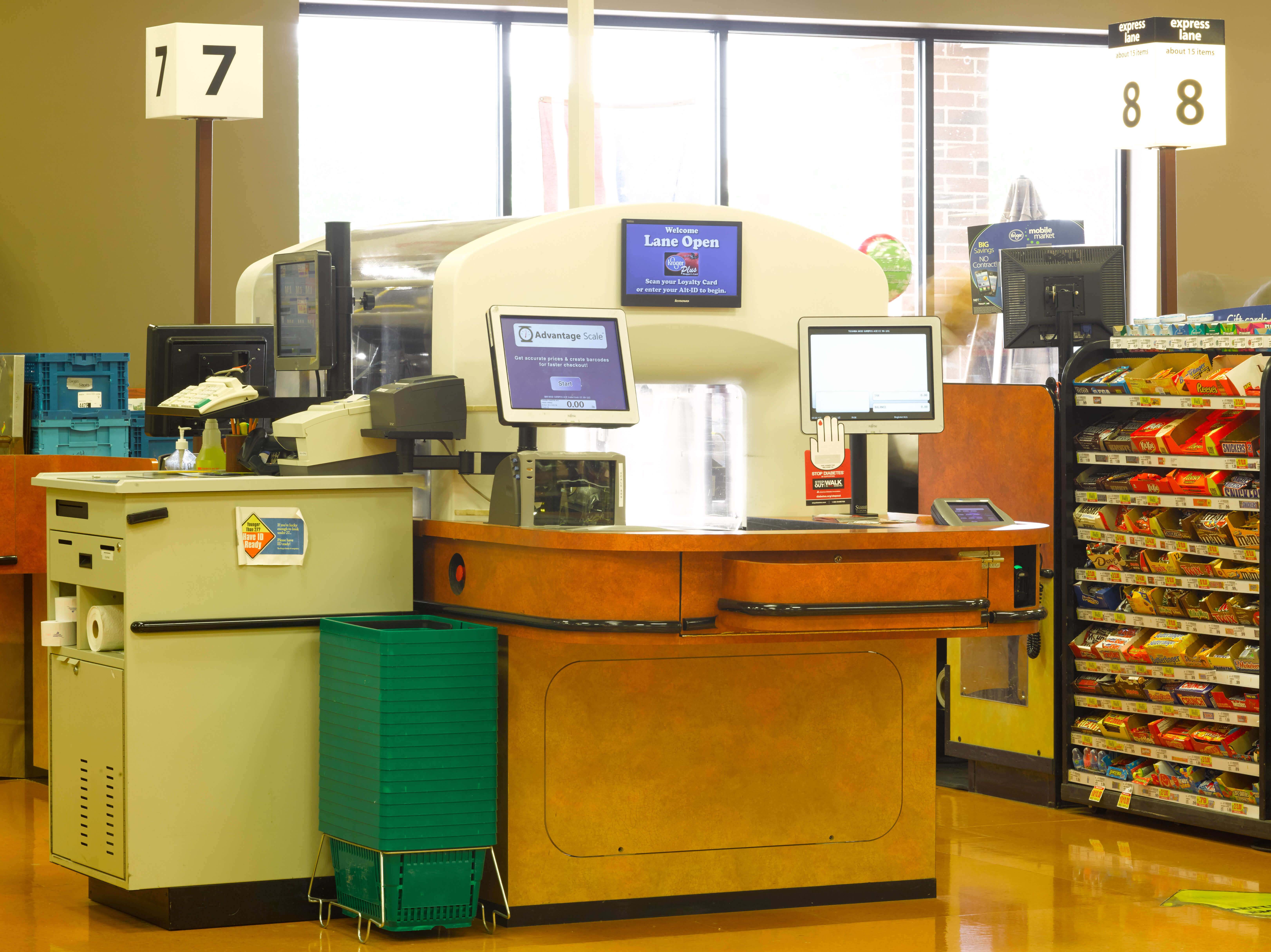 Automated laser scanning checkout register