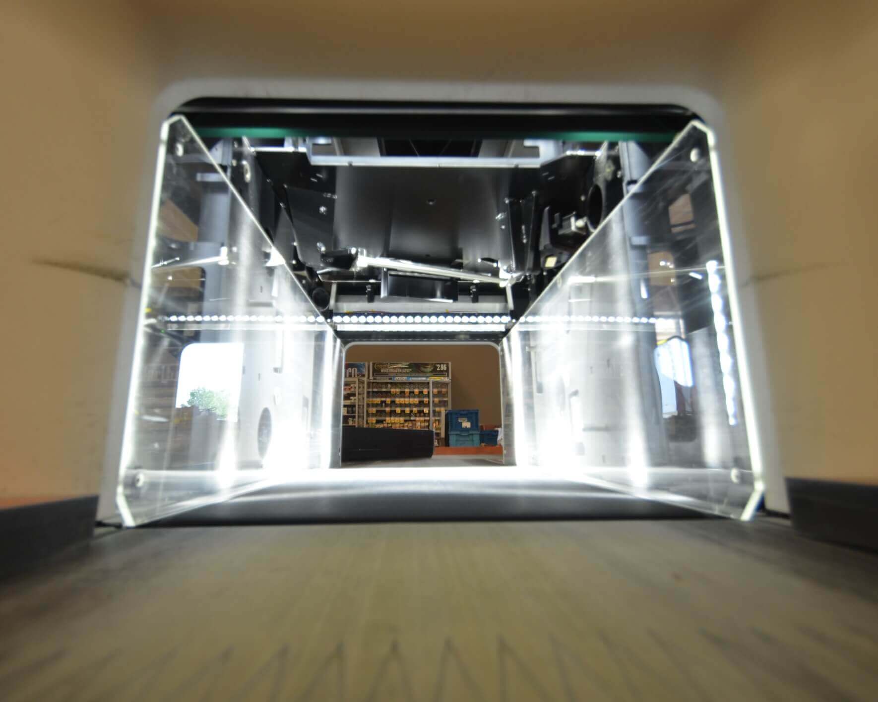 Inside the tunnel of an automated laser scanning checkout register