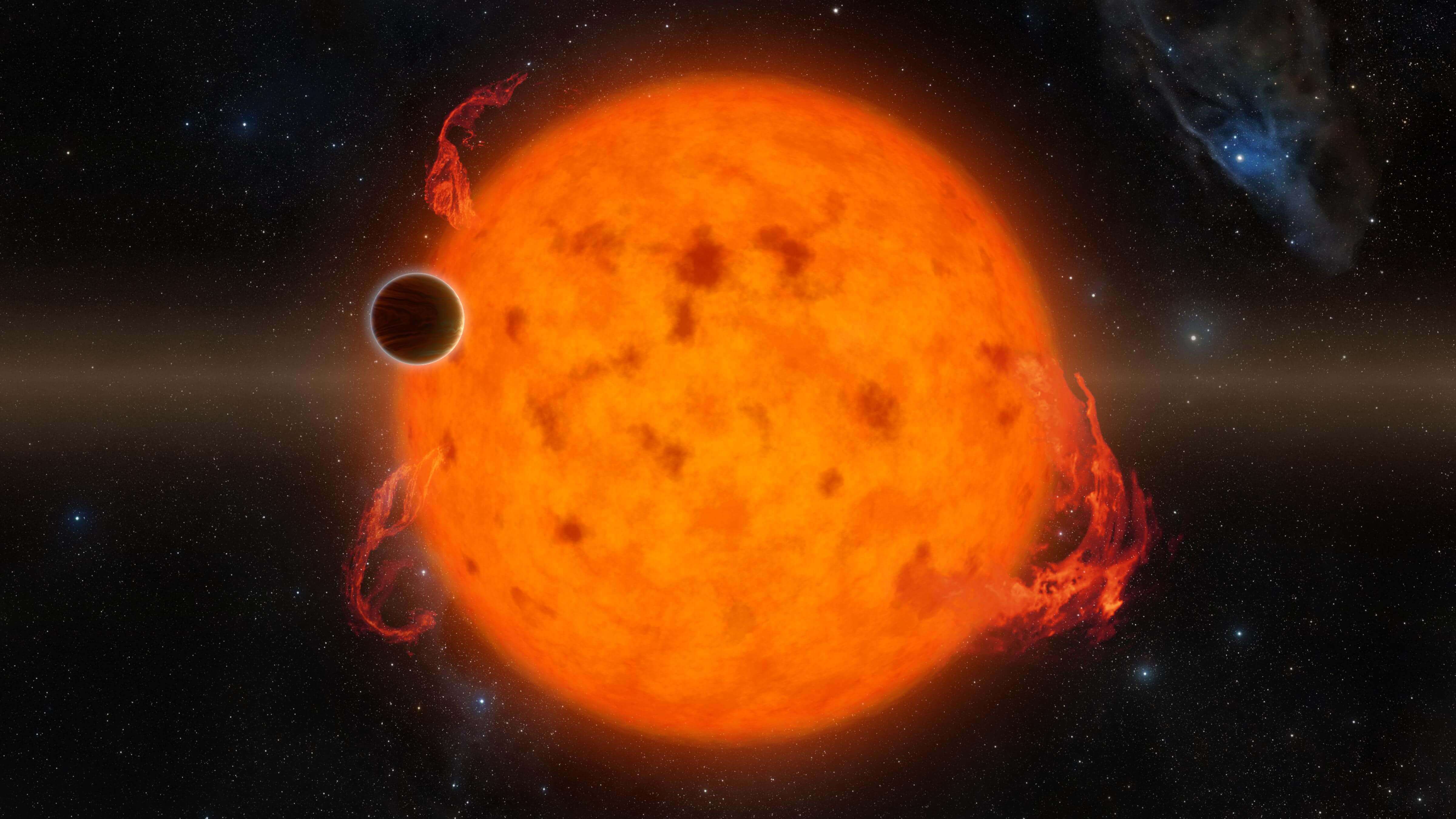 Artist's depiction of a large exoplanet orbiting very close to its star