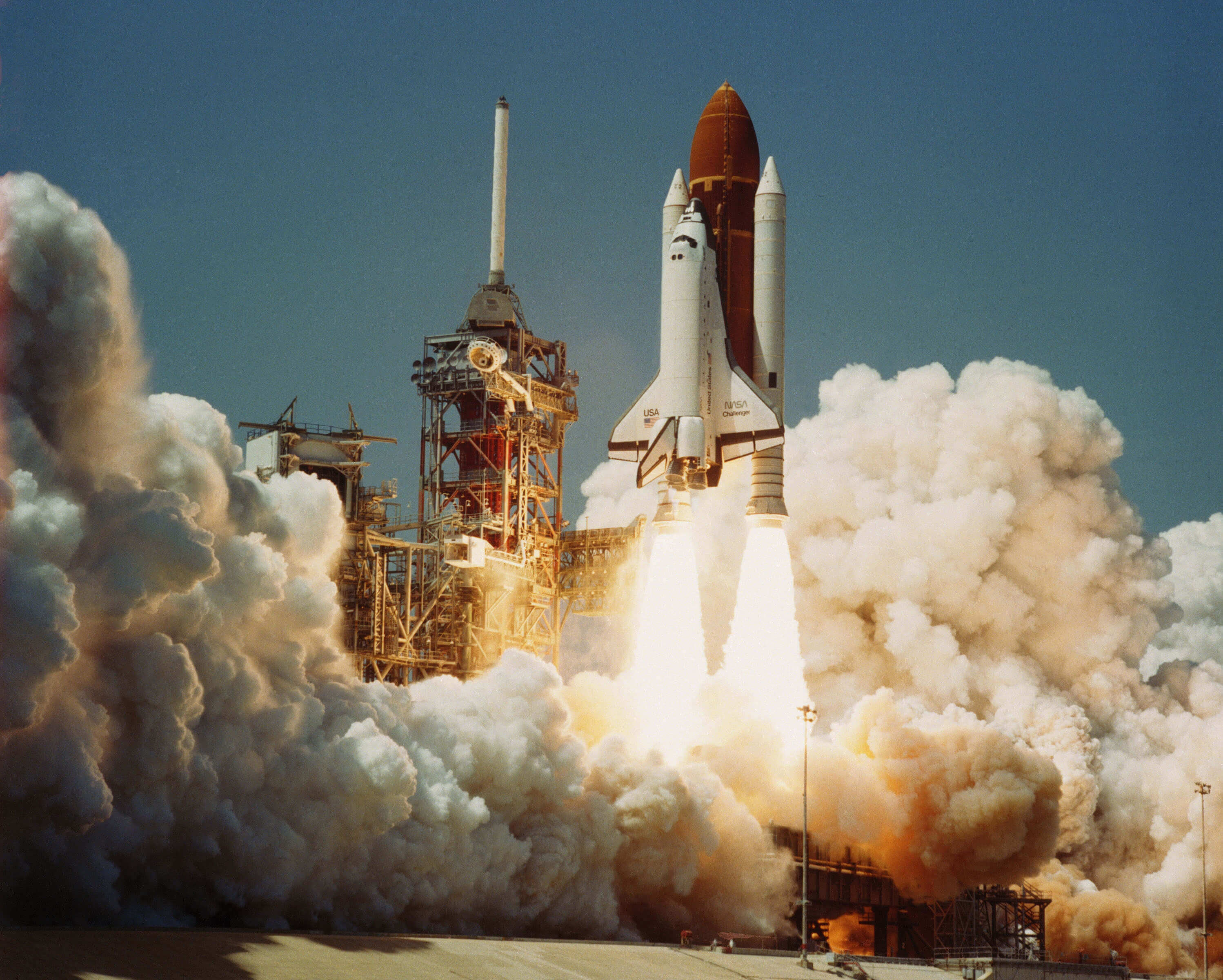 The Space Shuttle lifting off 
