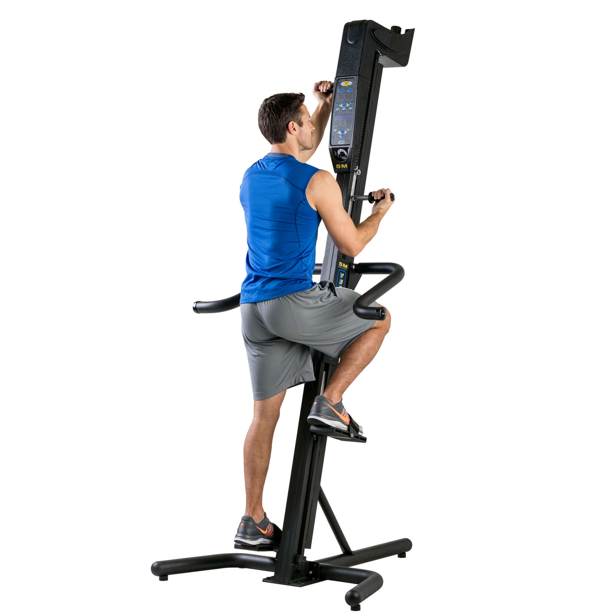 Man using Versaclimber home workout system 