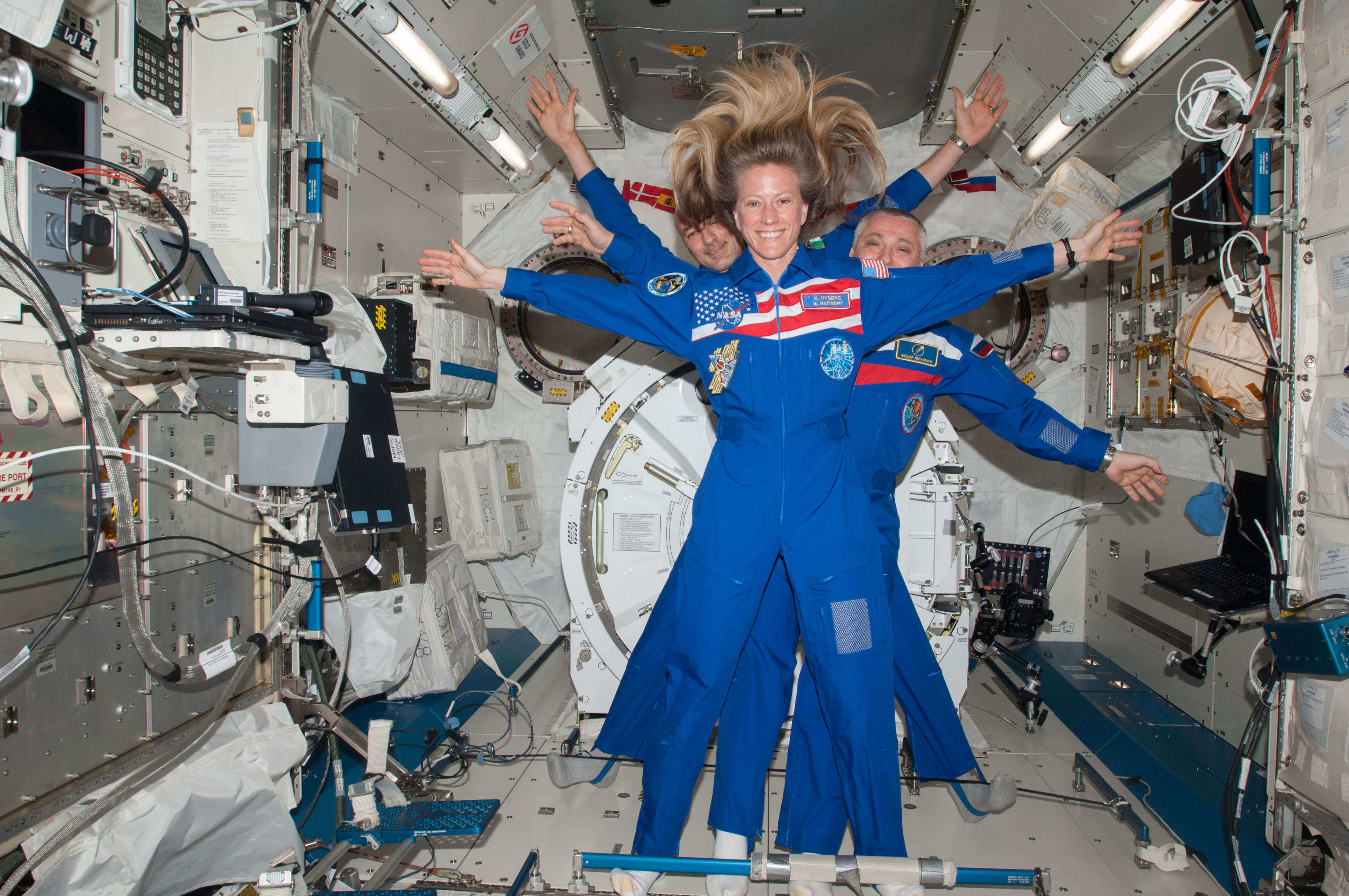 Astronauts goof off in zero gravity aboard the International Space Station 