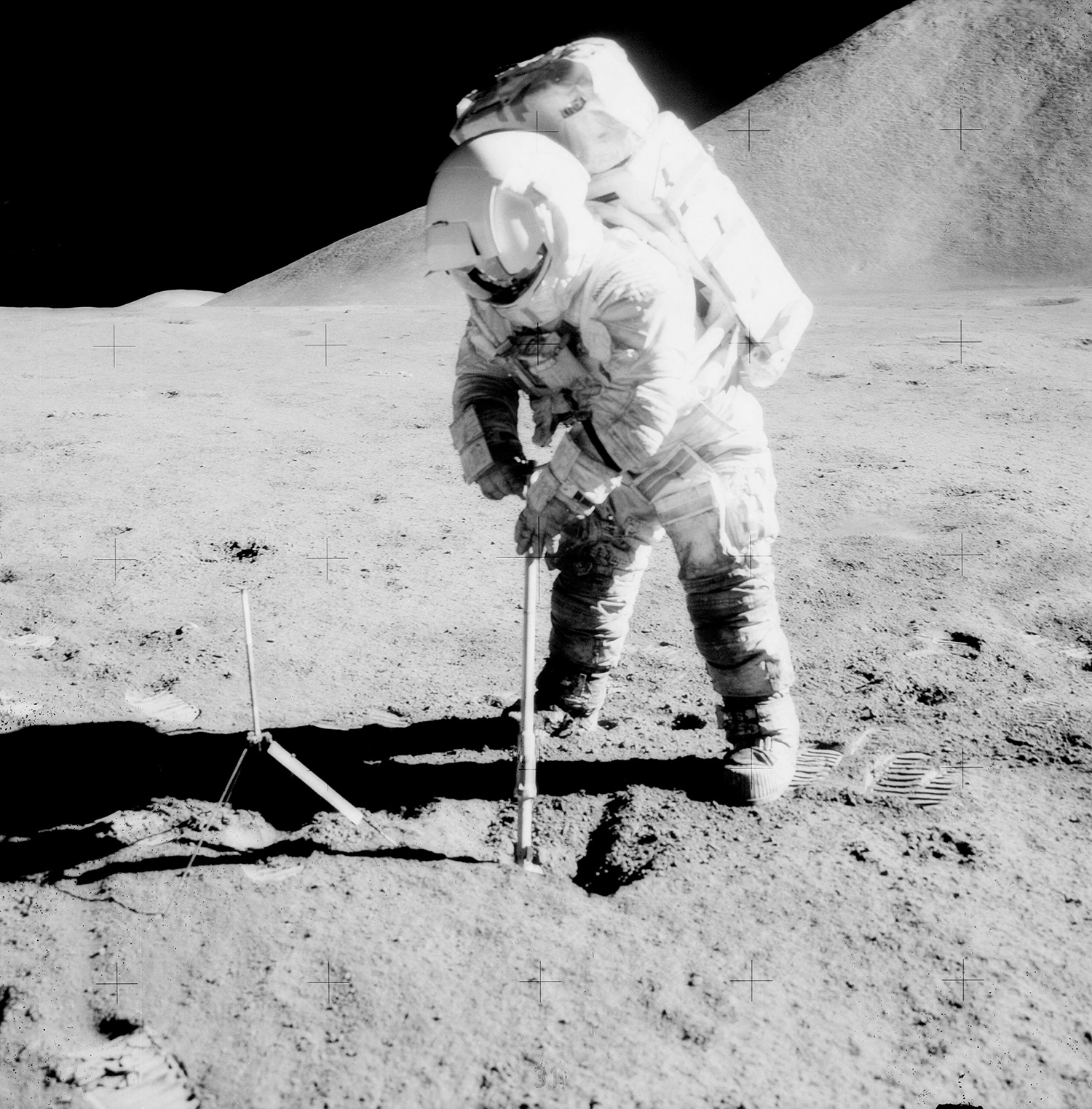 Apollo astronaut working on the surface of the moon