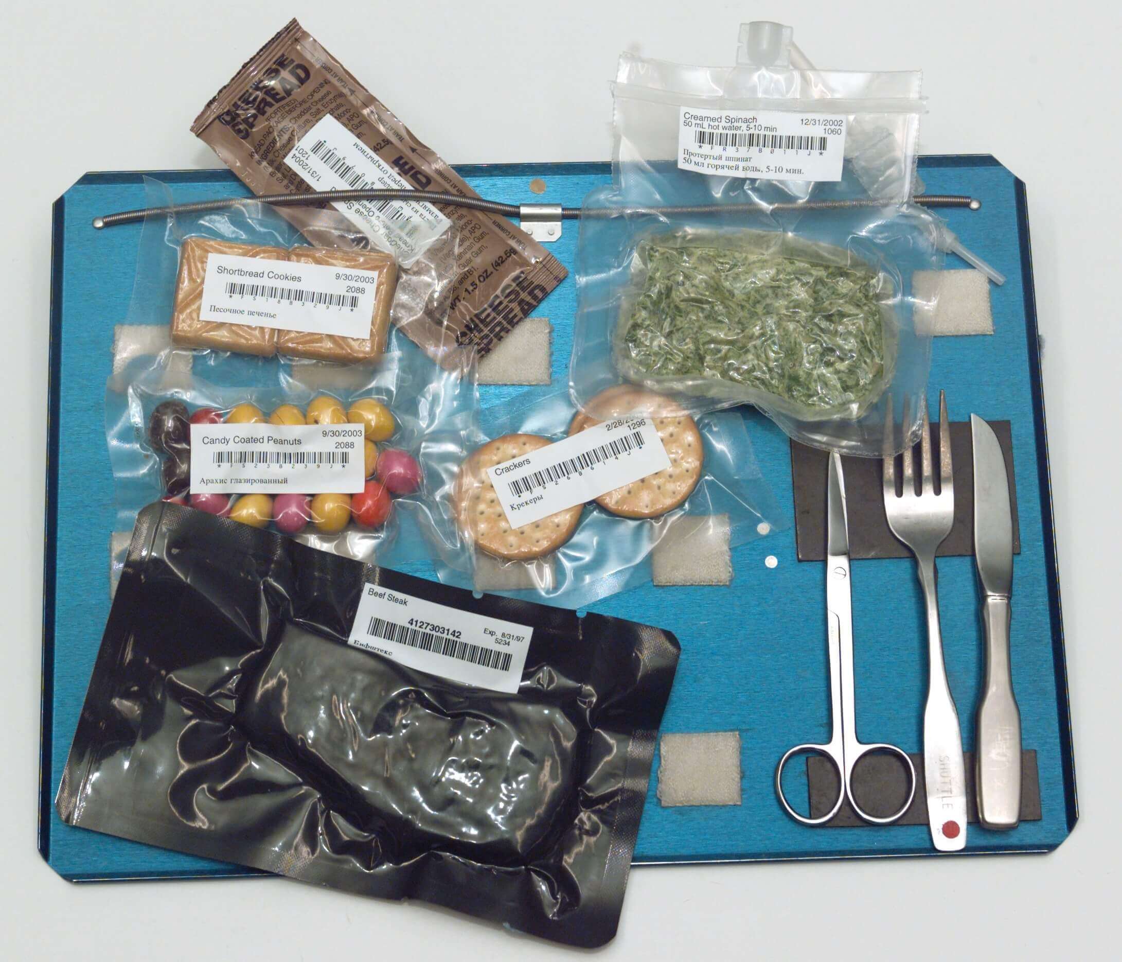 A typical spread of packaged products consumed by astronauts aboard the International Space Station