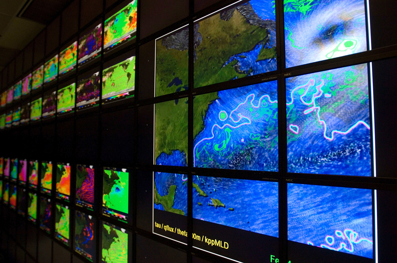 Wall of displays showing NASA Earth science data