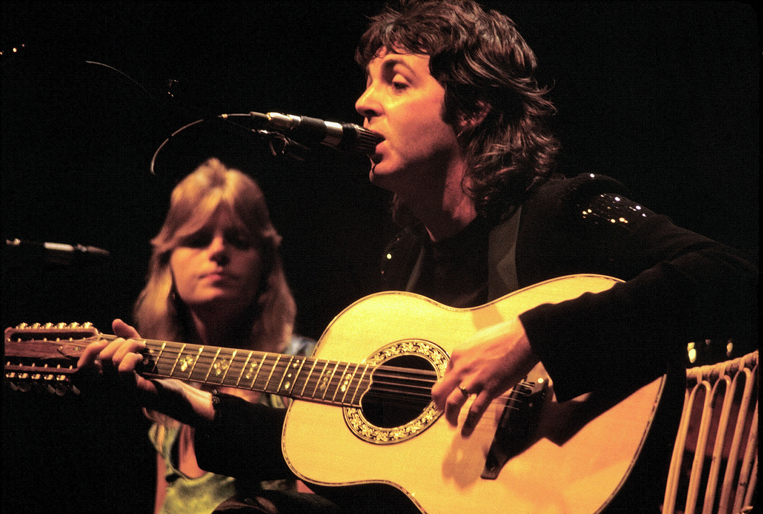 Paul McCartney in concert with an Ovation guitar