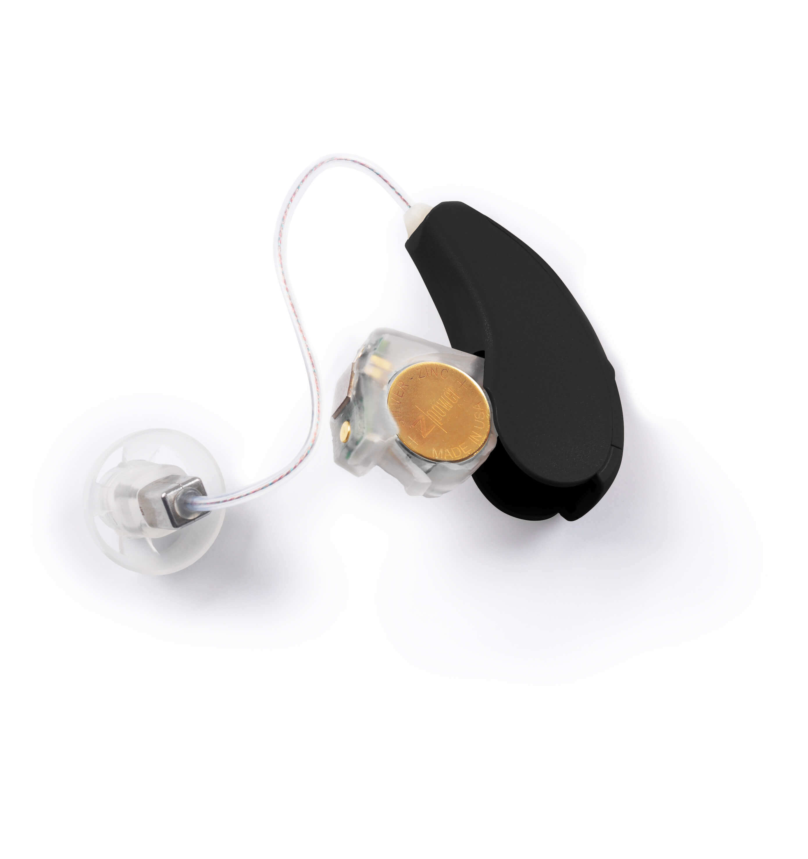 Hearing aid, shown with a silver-zinc rechargeable battery