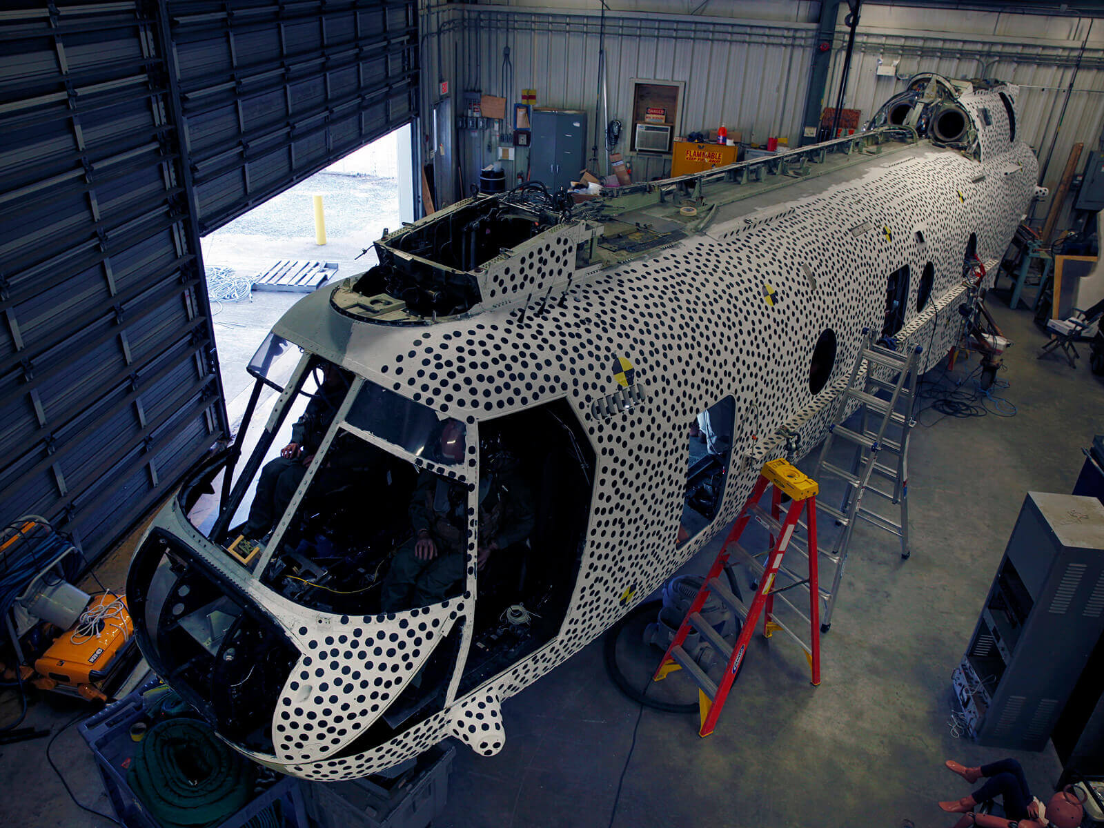 A test aircraft within a building.