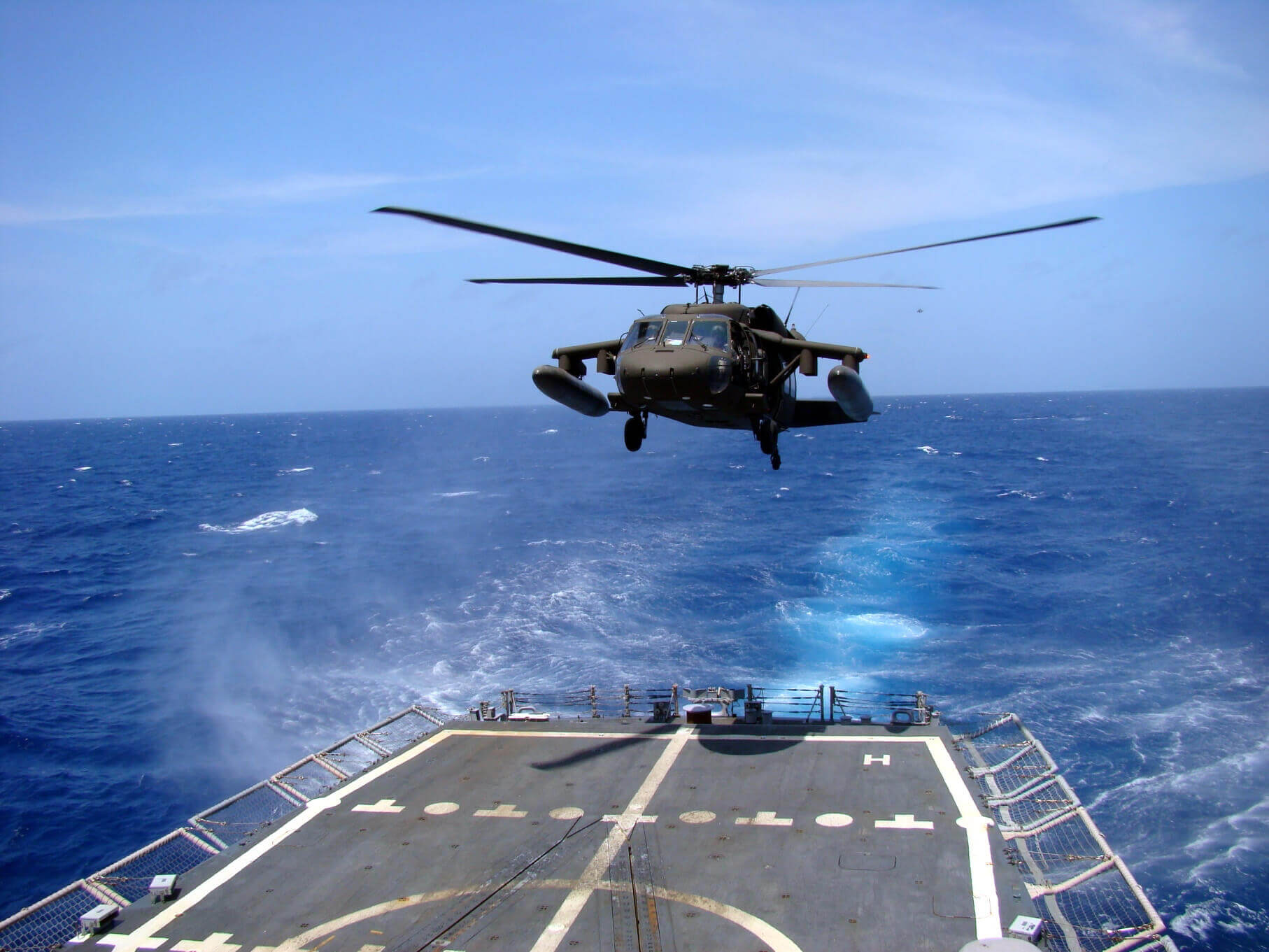 Black Hawk helicopter coming in for a landing at sea