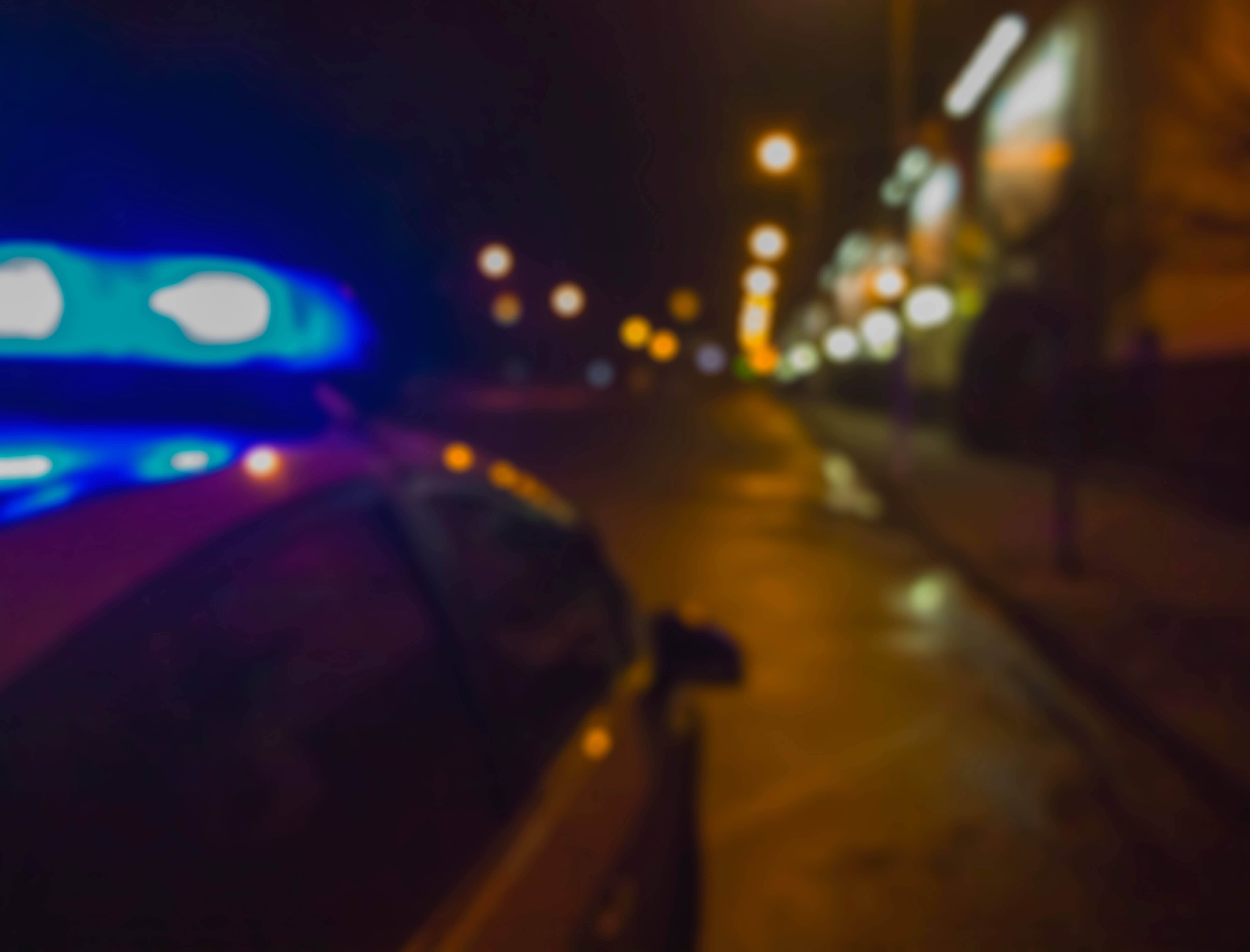 Police cruiser with lights flashing 