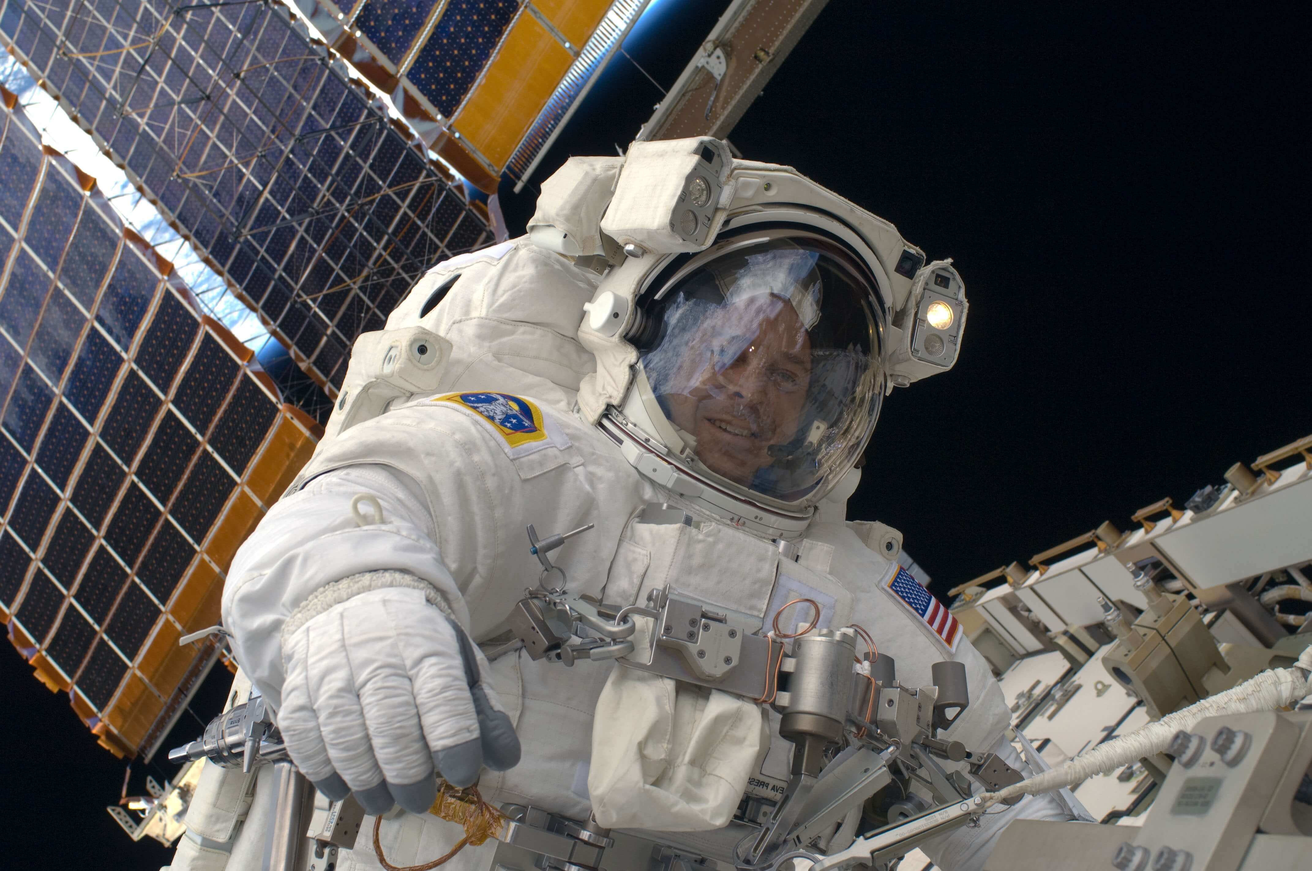 Astronaut on a spacewalk outside the International Space Station 