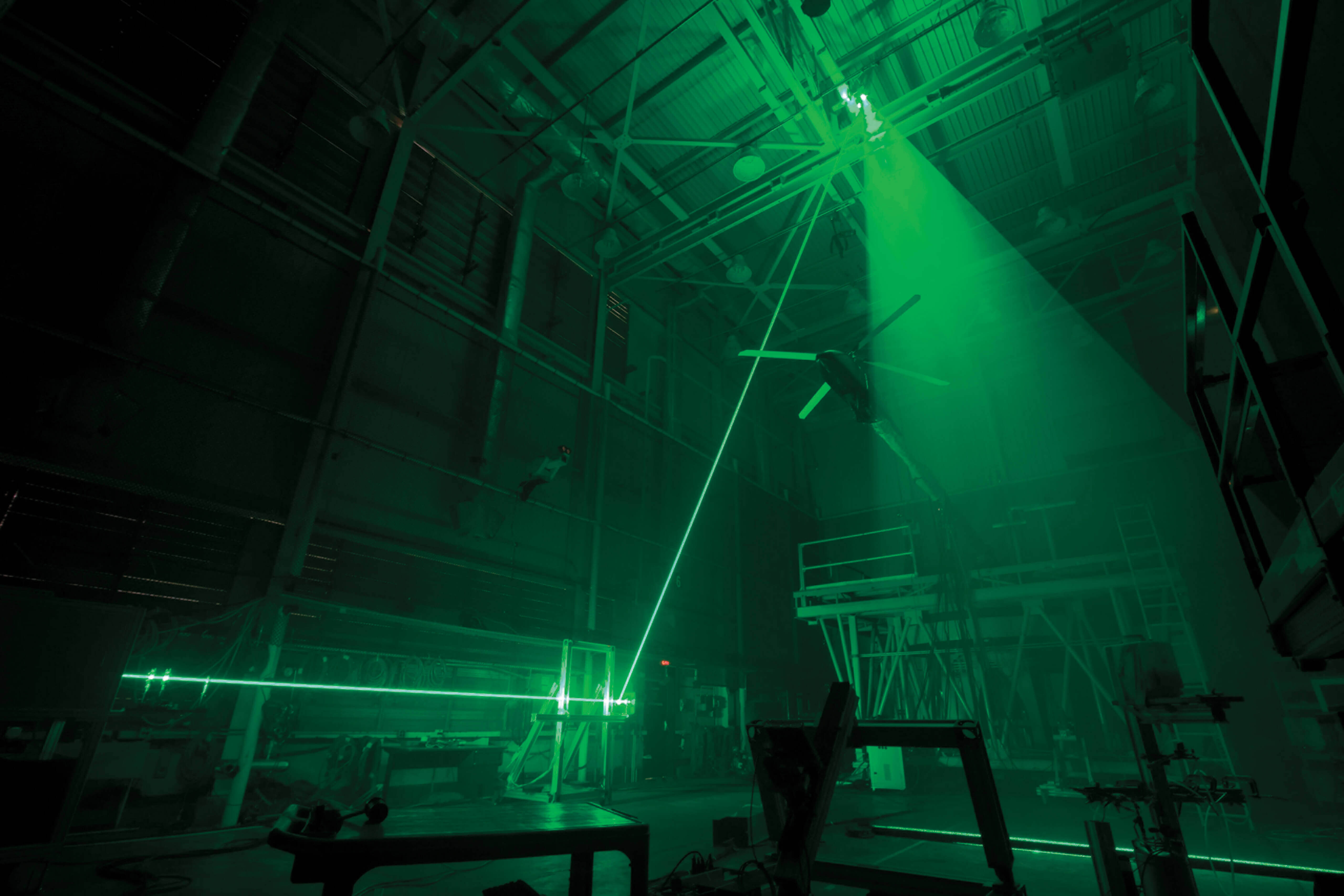 Lasers firing in a NASA test facility