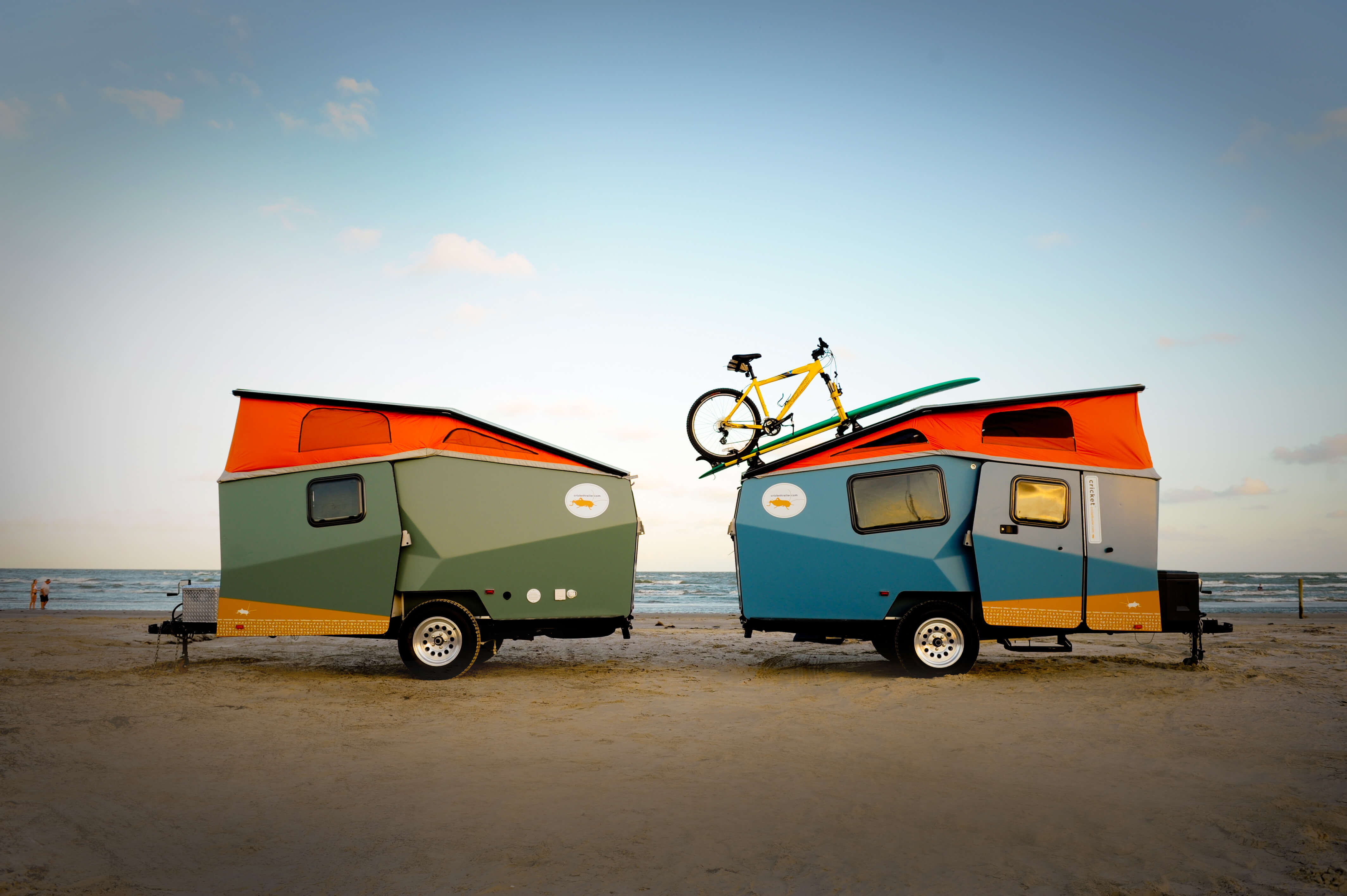 Two Cricket trailers on a beach 