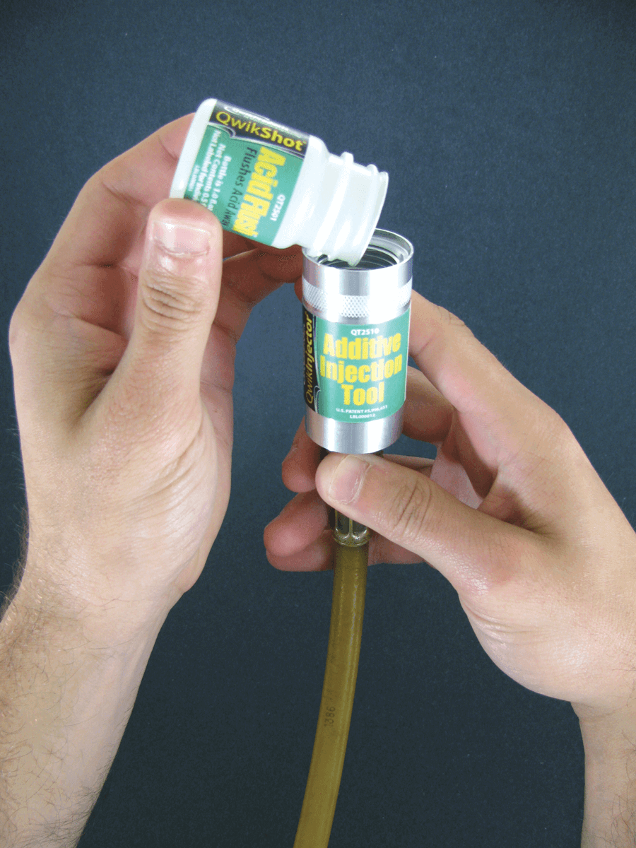 Hands administer a QwikShot acid flush 