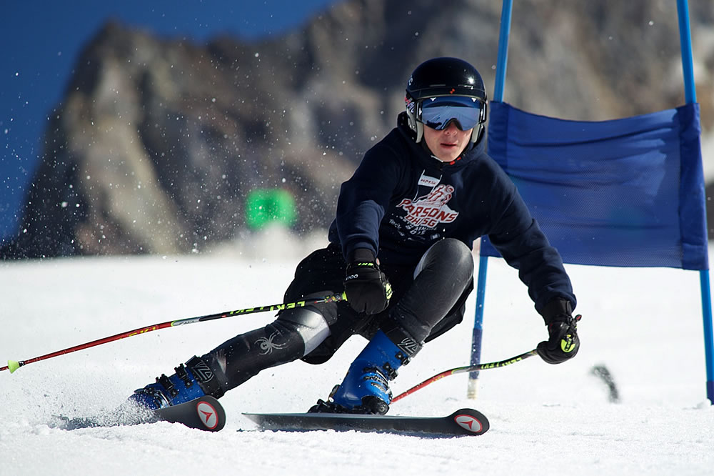 Skier racing down the slopes